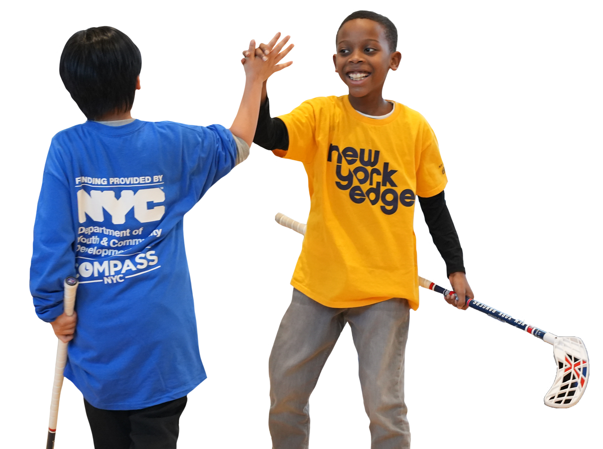 New York Edge students giving high five playing hockey